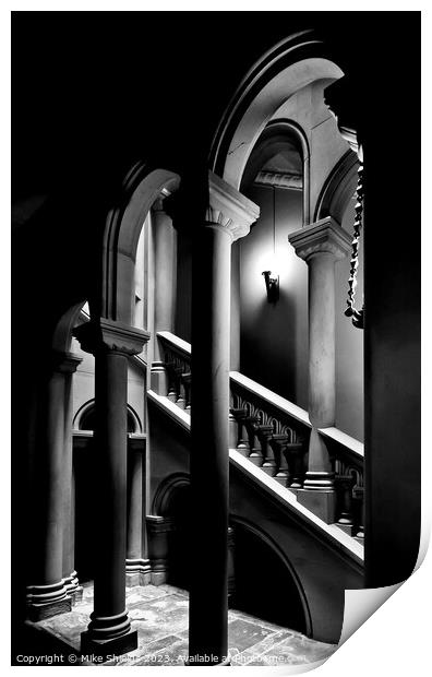 Illuminated Stairwell Arches at Penrhyn Castle Print by Mike Shields