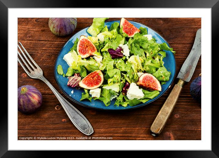 Salad with figs, herbs and cheese on wooden table. Framed Mounted Print by Mykola Lunov Mykola