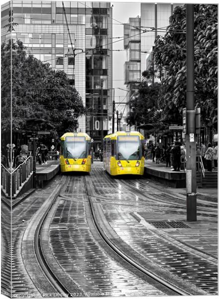 Manchester Trams In The Rain Canvas Print by Rick Lindley