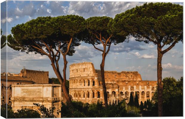 Colosseum and Arch of Titus at Sunset Canvas Print by Artur Bogacki