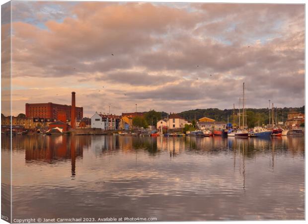 Serene Sunrise over Baltic Wharf Canvas Print by Janet Carmichael