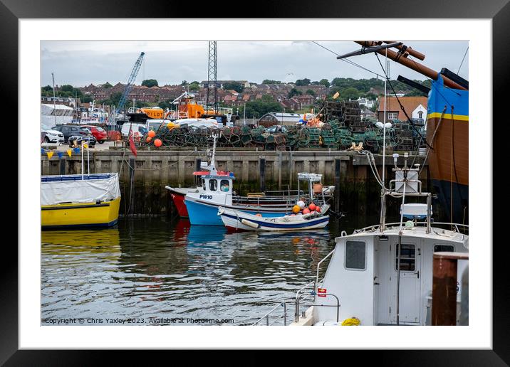 Fishing boats in Whitby harbour Framed Mounted Print by Chris Yaxley