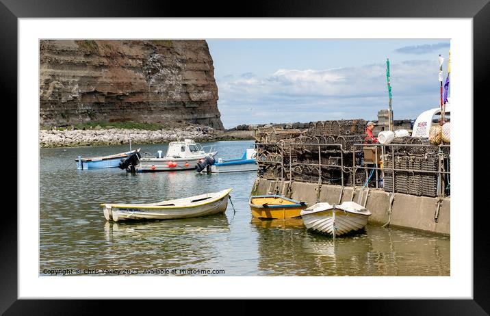 Fishing boats in Staithes Harbour Framed Mounted Print by Chris Yaxley