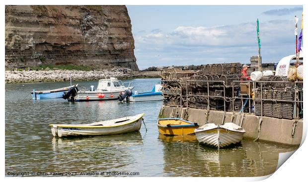 Fishing boats in Staithes Harbour Print by Chris Yaxley