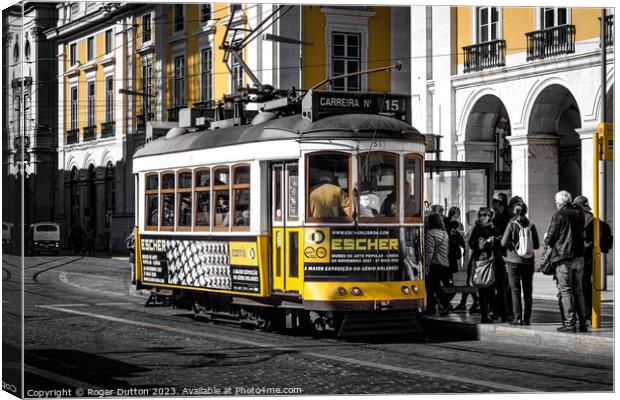 Lisbon's Iconic Electric Tram Canvas Print by Roger Dutton