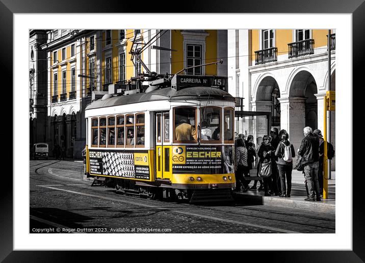 Lisbon's Iconic Electric Tram Framed Mounted Print by Roger Dutton