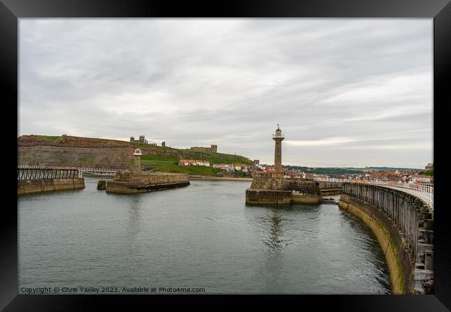 The entrance to Whitby harbour Framed Print by Chris Yaxley