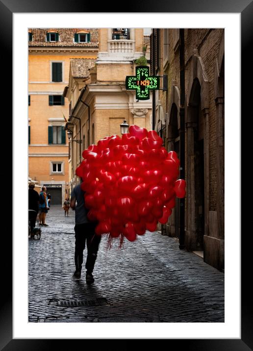Men With Red Balloons On Cobblestone Street Framed Mounted Print by Artur Bogacki