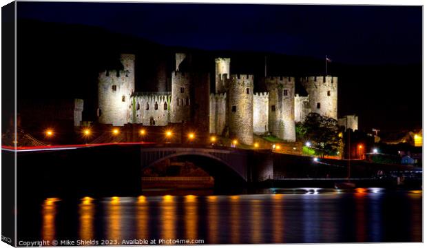 Illuminated Conwy Castle: A Nighttime Spectacle Canvas Print by Mike Shields