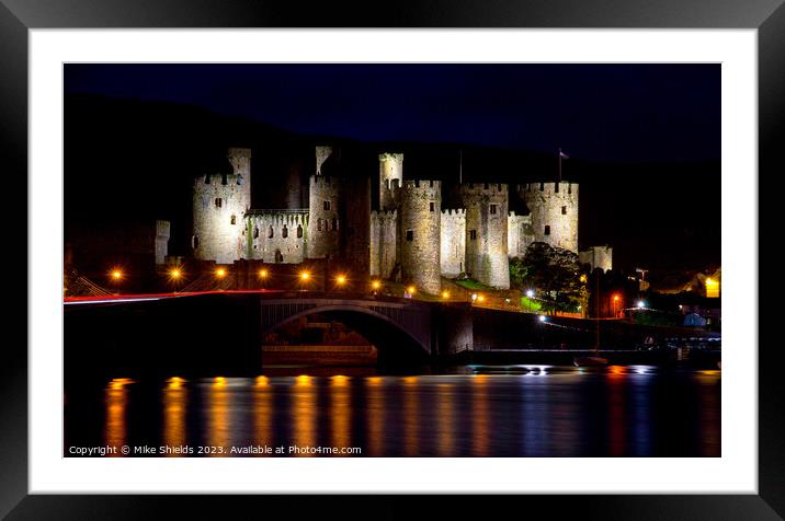 Illuminated Conwy Castle: A Nighttime Spectacle Framed Mounted Print by Mike Shields
