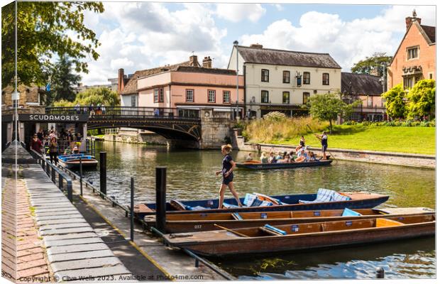 Preparing the punts on the River Cam Canvas Print by Clive Wells