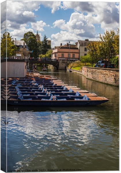 A neat row of punts Canvas Print by Clive Wells