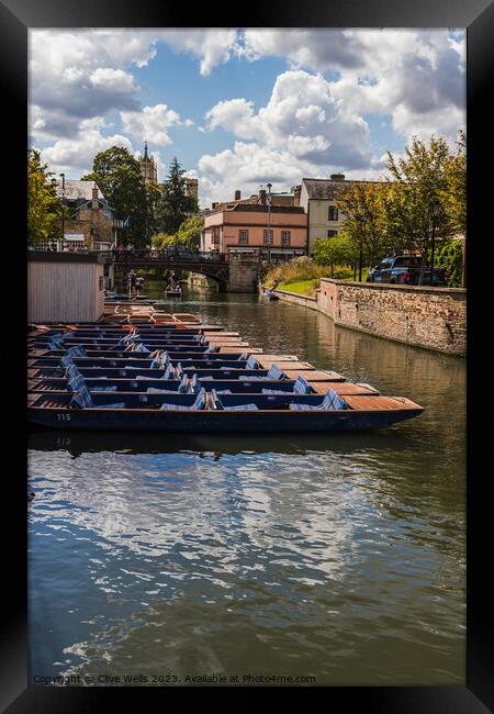 A neat row of punts Framed Print by Clive Wells