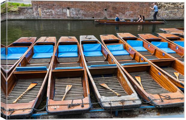Row of punts Canvas Print by Clive Wells