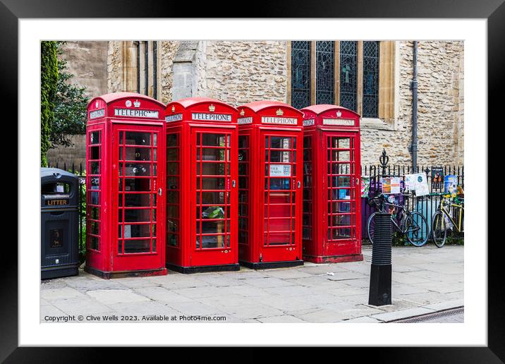 Telephone boxes Framed Mounted Print by Clive Wells