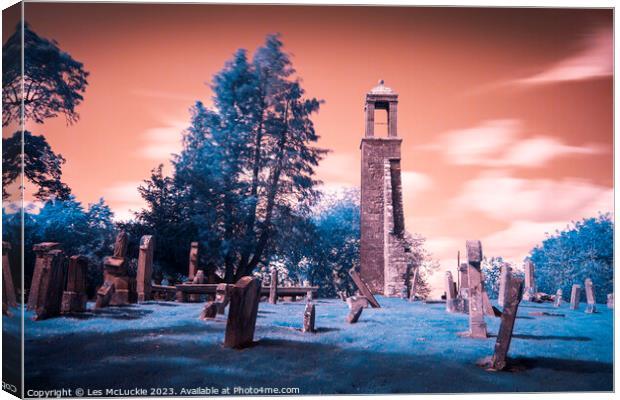 Infrared Churchyard Canvas Print by Les McLuckie