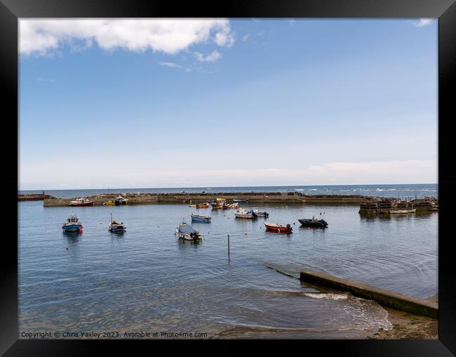Sunny day at Staithes Harbour, North Yorkshire Framed Print by Chris Yaxley