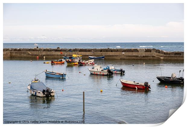 Fishing boats in Staithes Harbour Print by Chris Yaxley