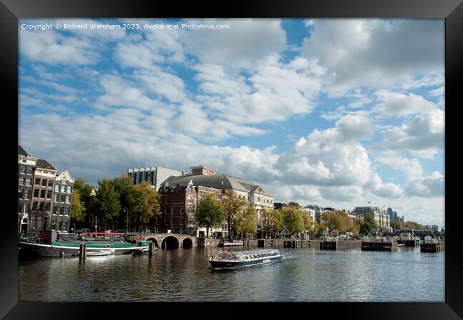 River Amstel with Royal Theatre Carre  Framed Print by Richard Wareham