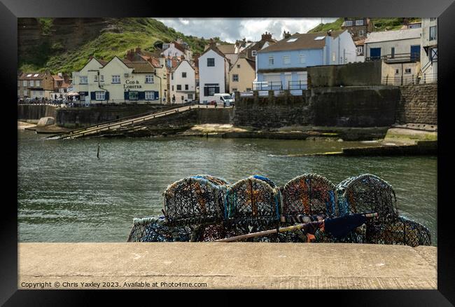 The seaside village of Staithes Framed Print by Chris Yaxley