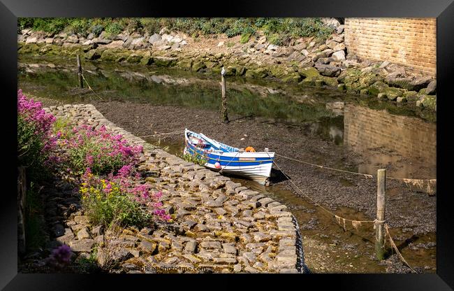 Fishing boat on the river Framed Print by Chris Yaxley