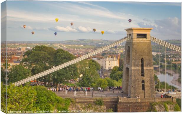 Vibrant Hot Air Balloons over Bristol Canvas Print by Janet Carmichael