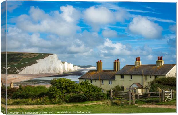 Coastguard Cottages and the Seven Sisters Canvas Print by Sebastien Greber