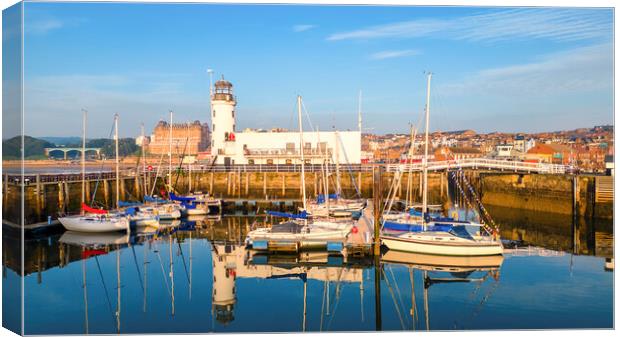 Scarborough Lighthouse Reflections Canvas Print by Tim Hill