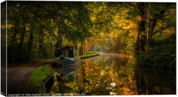 Serene Dawn over Autumnal Canal Canvas Print by Clive Ingram