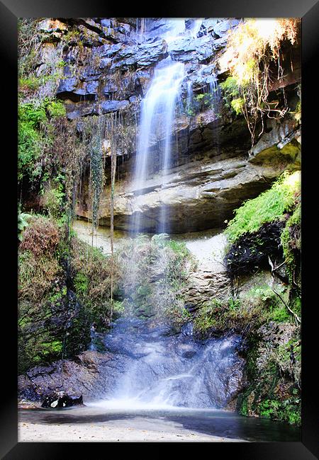 Secluded Tranquil Waterfall Framed Print by Clare FitzGerald