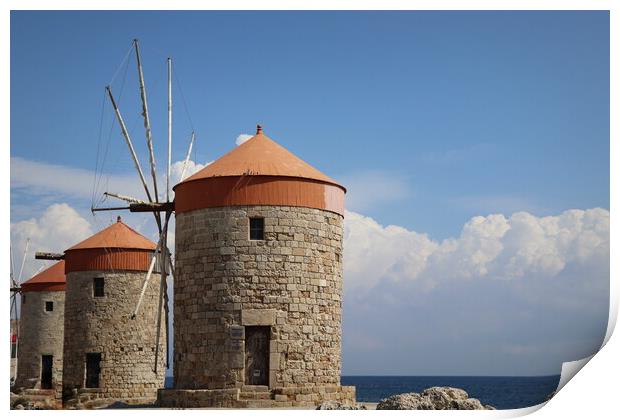 Windmills at the seafront in the city of Rhodes in Rhodes island in Greece Print by Virginija Vaidakaviciene