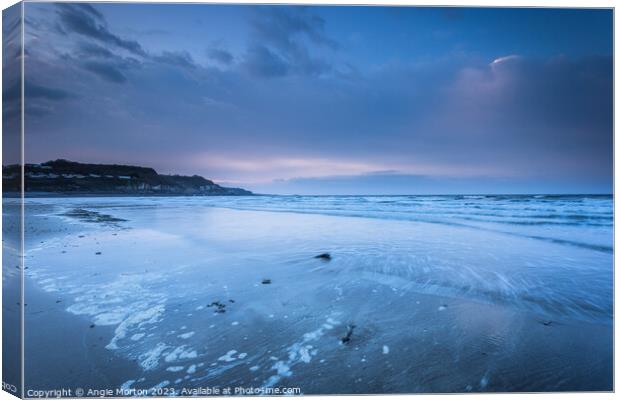 Benllech Beach Incoming Tide Canvas Print by Angie Morton