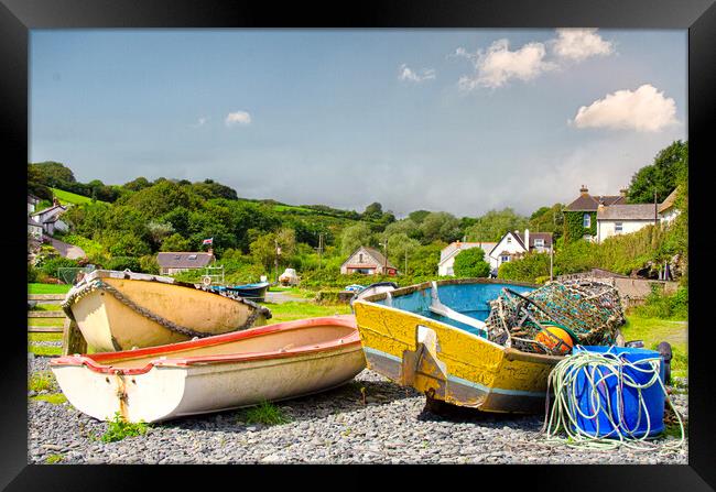 fishing boats on a beach Framed Print by kathy white