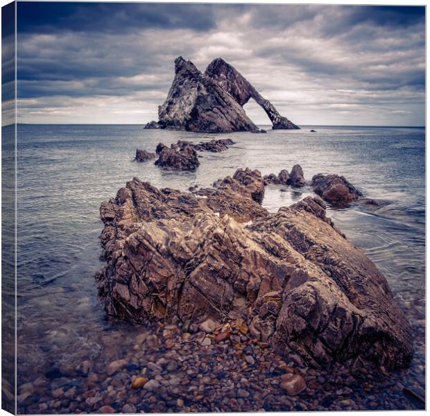 Bow Fiddle Rock Formation at Portknockie Canvas Print by John Frid