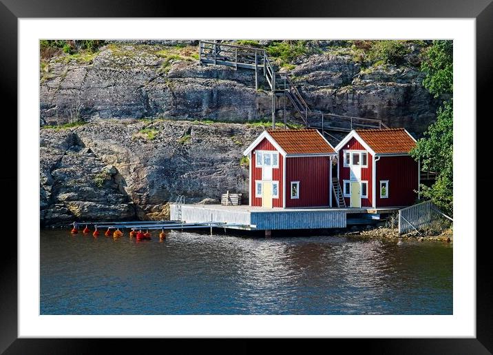 Boathouses on Orust Island in Western Sweden Framed Mounted Print by Martyn Arnold