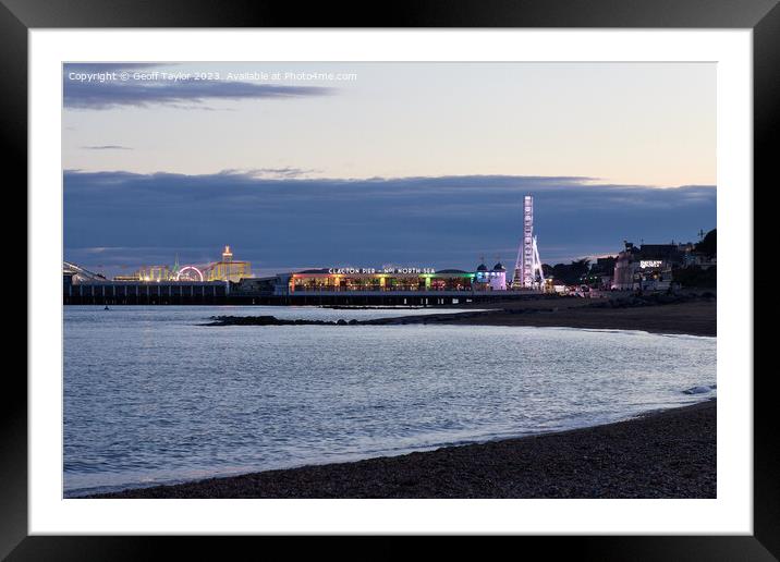 clacton pier as evening falls Framed Mounted Print by Geoff Taylor