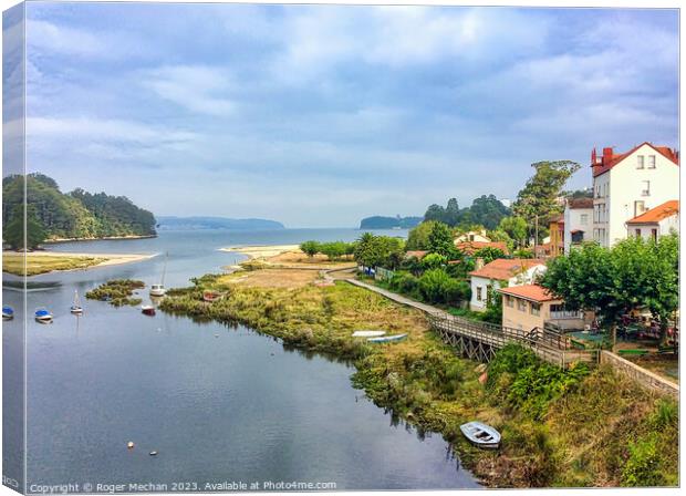 Coastal village in northern Spain Canvas Print by Roger Mechan