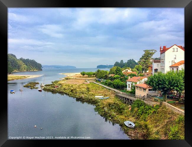 Coastal village in northern Spain Framed Print by Roger Mechan