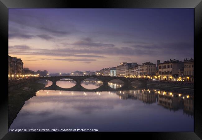 Carraia medieval Bridge on Arno river at sunset. Florence, Italy Framed Print by Stefano Orazzini