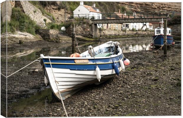 Fishing boat in the seaside village of Staithes Canvas Print by Chris Yaxley