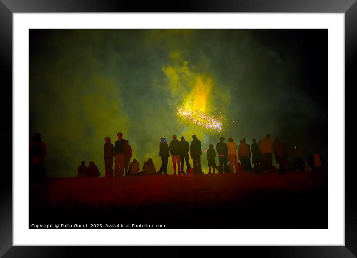 Fireworks celebration on West bay beach Dorset Framed Mounted Print by Philip Gough