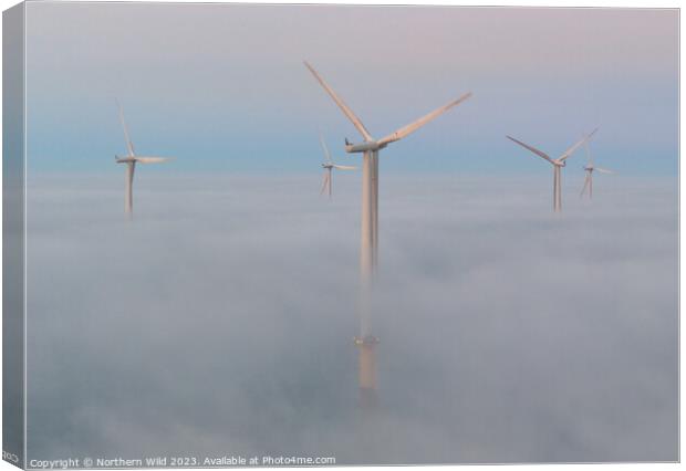 Wind turbines above the fog Canvas Print by Northern Wild
