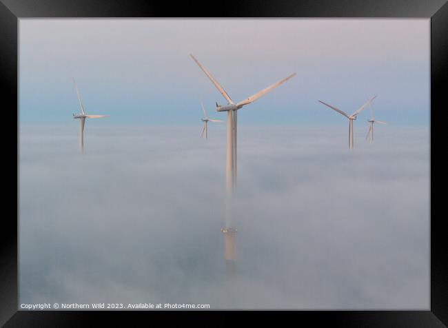 Wind turbines above the fog Framed Print by Northern Wild