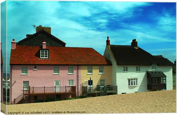 West Bay Cottages on the Beach Canvas Print by Les Schofield