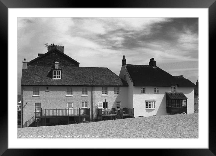 West Bay Beach Cottages Framed Mounted Print by Les Schofield
