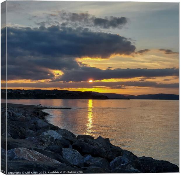 Sunset Doniford Bay Somerset Canvas Print by Cliff Kinch