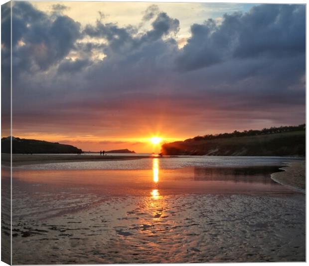 Sunset colours over Porth beach Cornwall  Canvas Print by Tony lopez