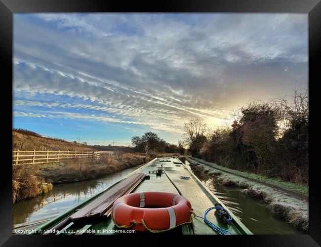 Narrowboat Travelling Down A Wintery Oxford Canal  Framed Print by Sandie 