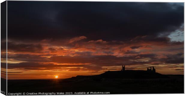 Dunstanburgh Castle, Northumberland Canvas Print by Creative Photography Wales