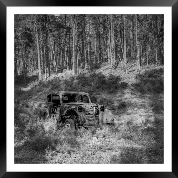 Abandoned in the forest. Framed Mounted Print by Garry Quinn